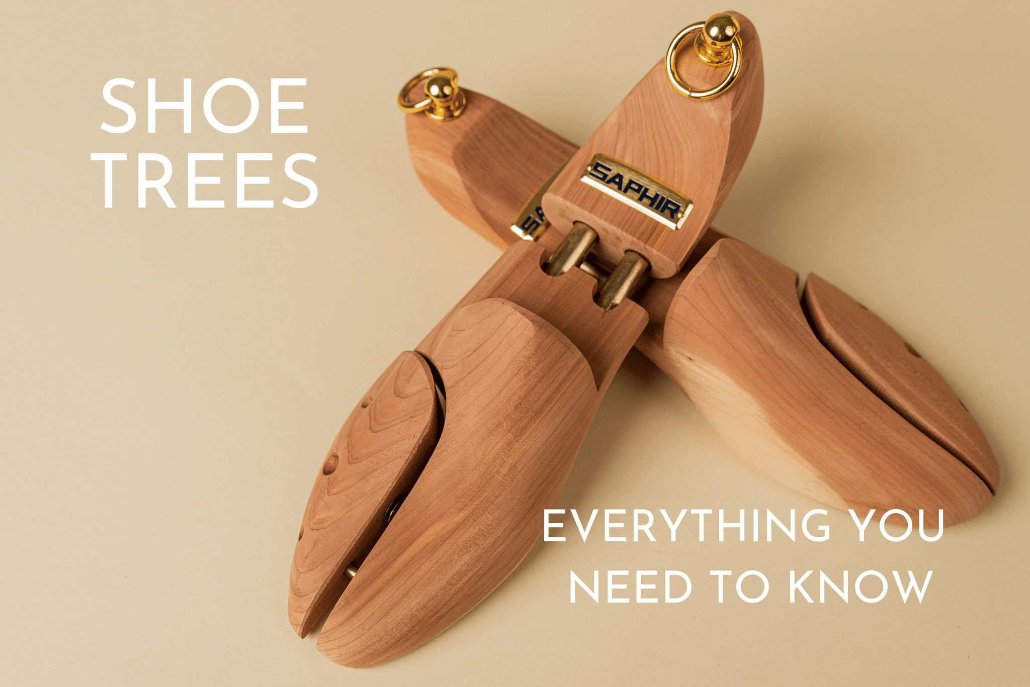 Everything you need to know about Shoe Trees blog photo. A close up of a pair of Saphir Beaute du cuir cedar wood shoe trees on plain background | Brillare Shoe Care - Official Saphir Reseller