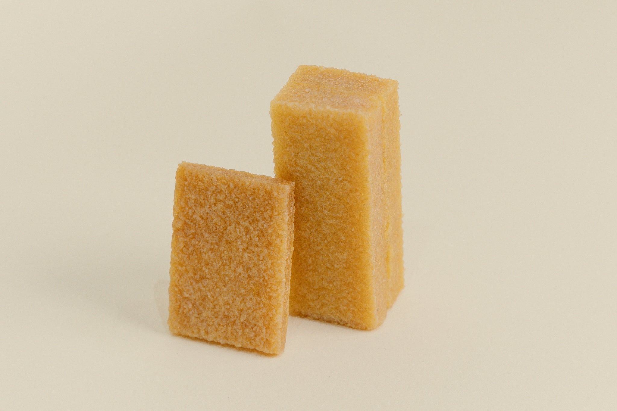 Brillaré Magic Brick suede eraser, nubuck cleaner, sneaker cleaner, sole edge cleaner, and suede care product close up size comparison between standard and XL  3