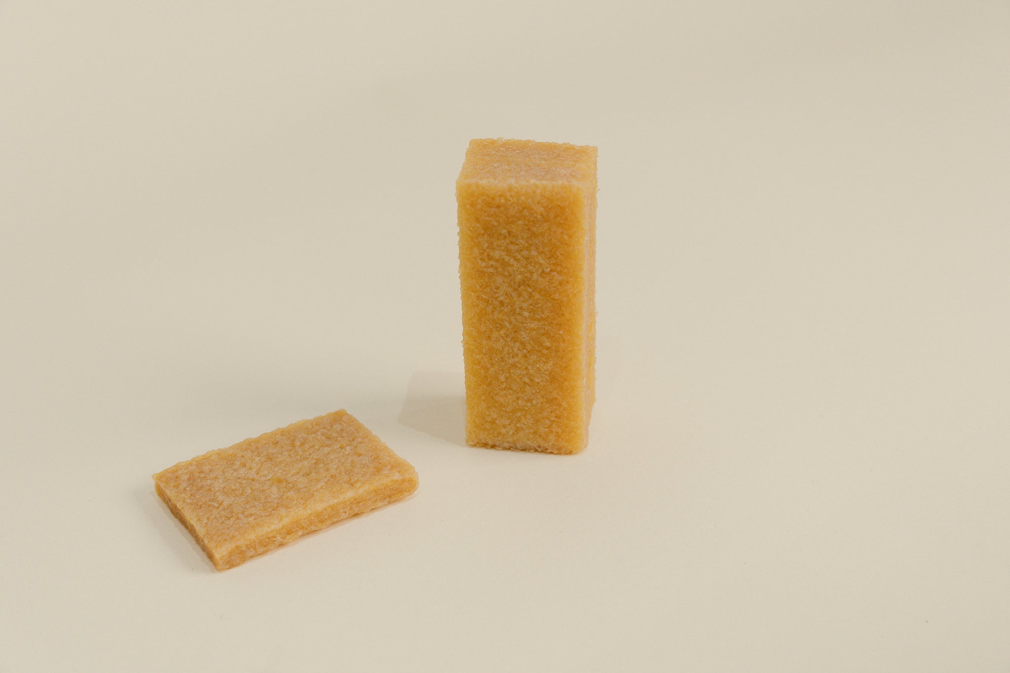 Brillaré Magic Brick suede eraser, nubuck cleaner, sneaker cleaner, sole edge cleaner, and suede care product close up size comparison between standard and XL 4