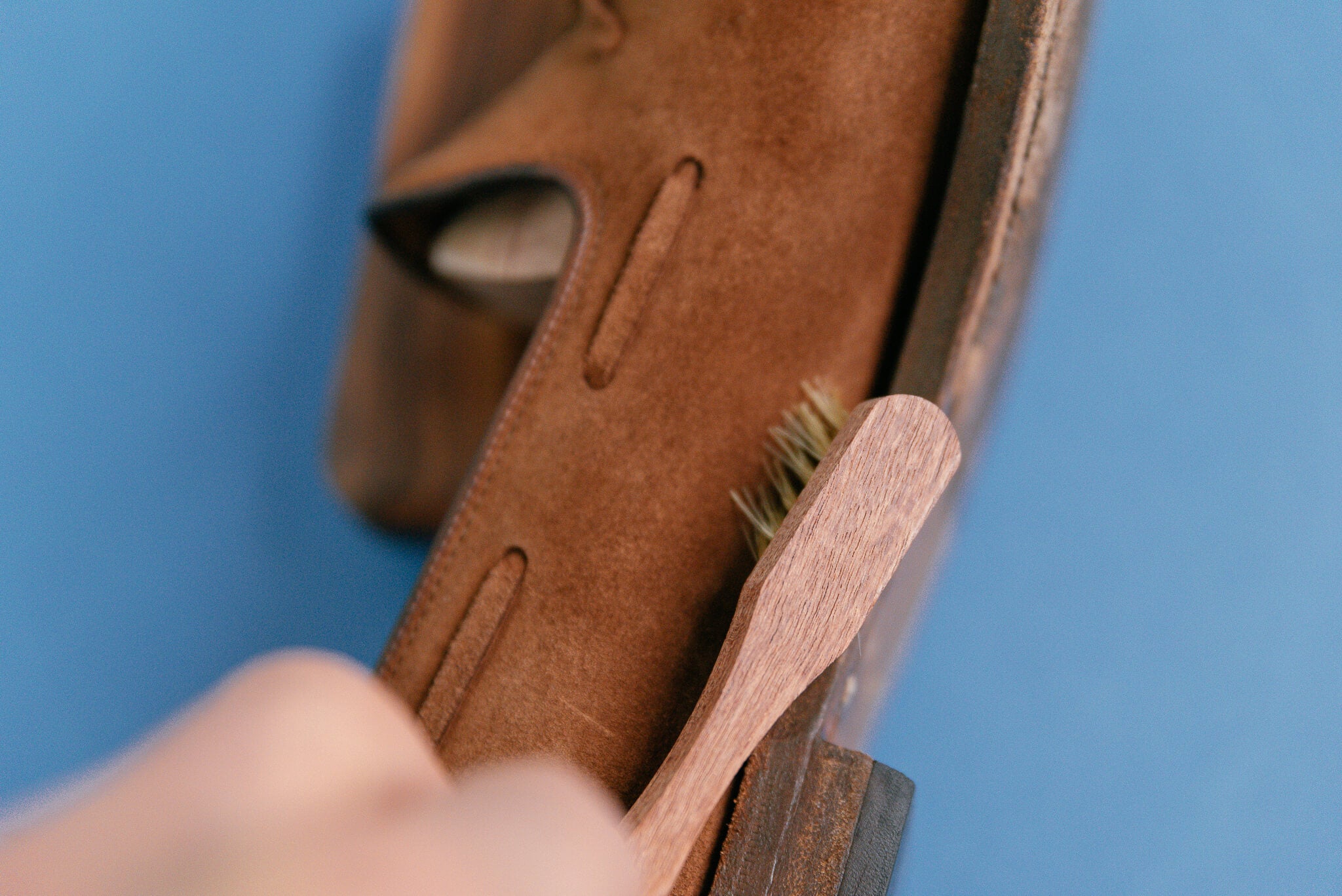 Saphir Medaille d'Or Welt Brush small spatula shown cleaning welt of Crockett & Jones Cavendish loafer in snuff suede 2